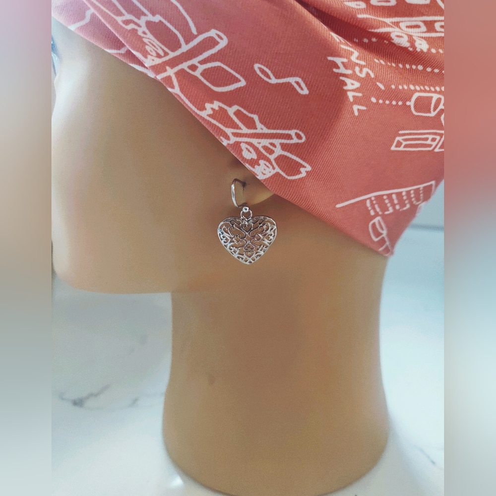New platinum heart earrings.